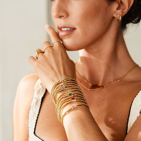 The Ultimate Guide to Stacking Bracelets: Beaded, Chain, and Charm Styles