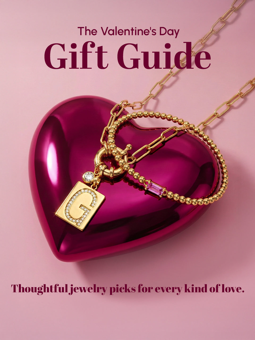 Valentine's Day gift guide with gold jewelry on a pink heart-shaped box