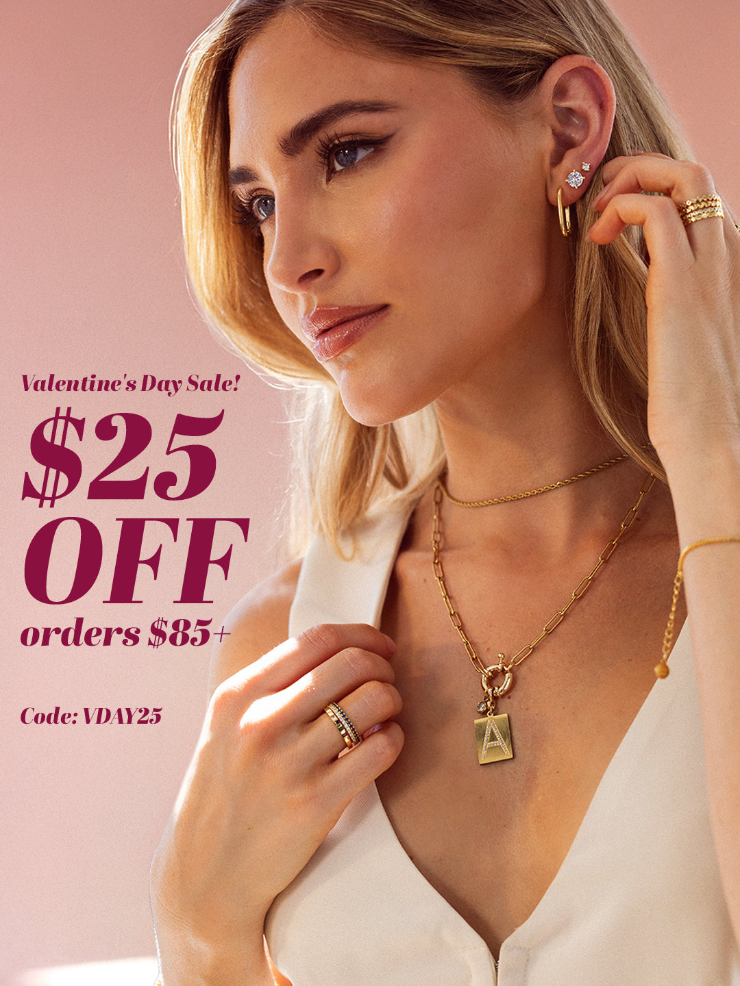 Woman wearing gold jewelry with a Valentine's Day sale advertisement on a pink background