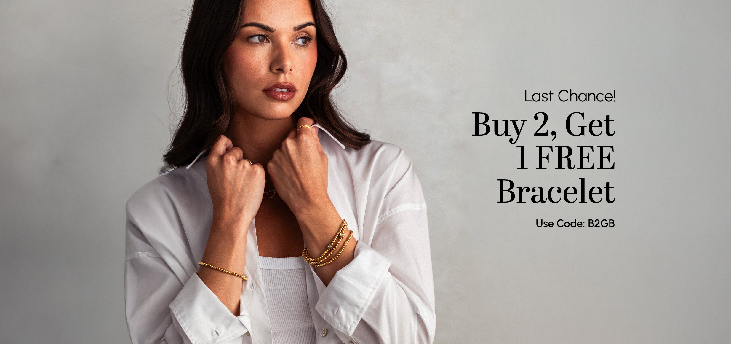 Woman wearing gold bracelets with promotional text on a gray background