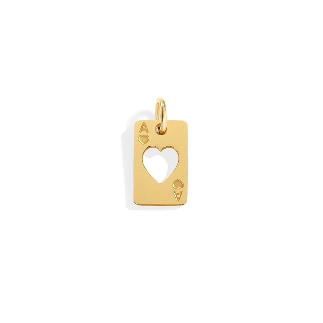 Gold pendant with heart design on a white background