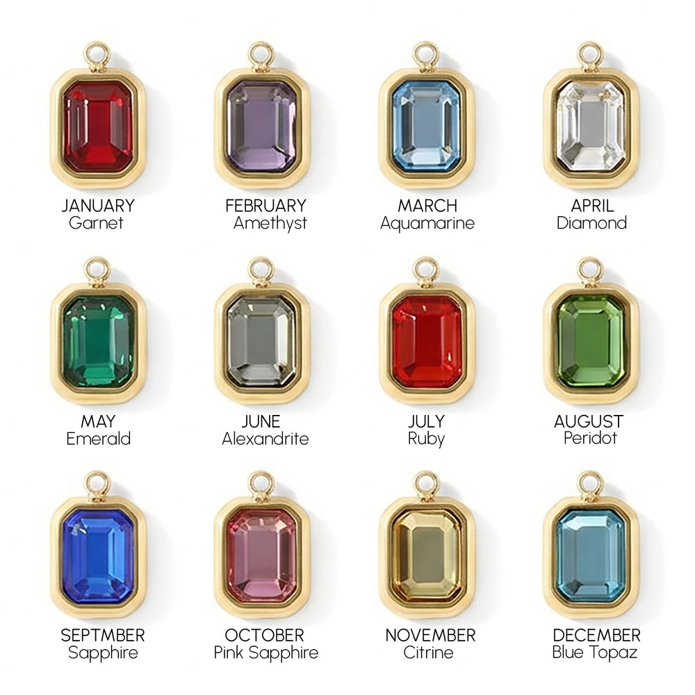 Jewelry pendants with gemstones for each month, labeled from January to December.