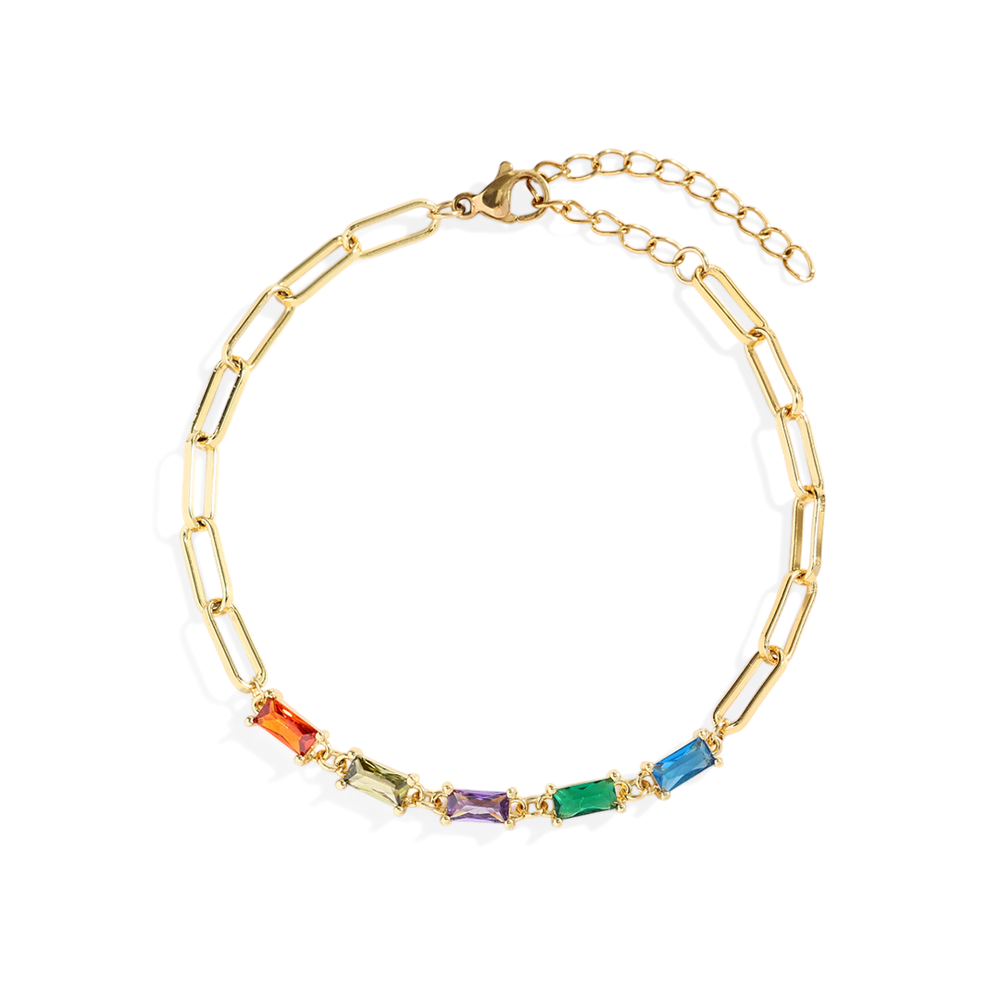 Gold bracelet with colorful gemstones on a white background