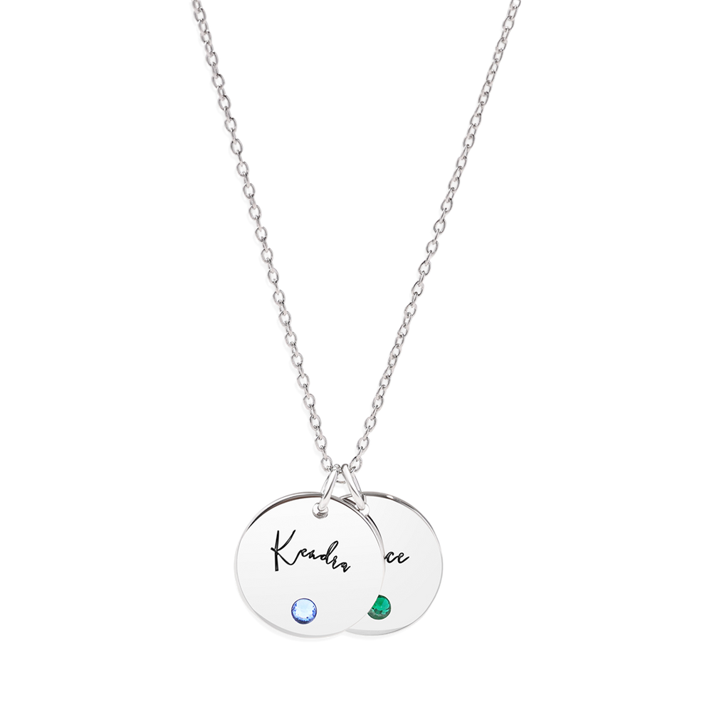 A gold disc name necklace with a birthstone, cable chain, and lobster clasp.