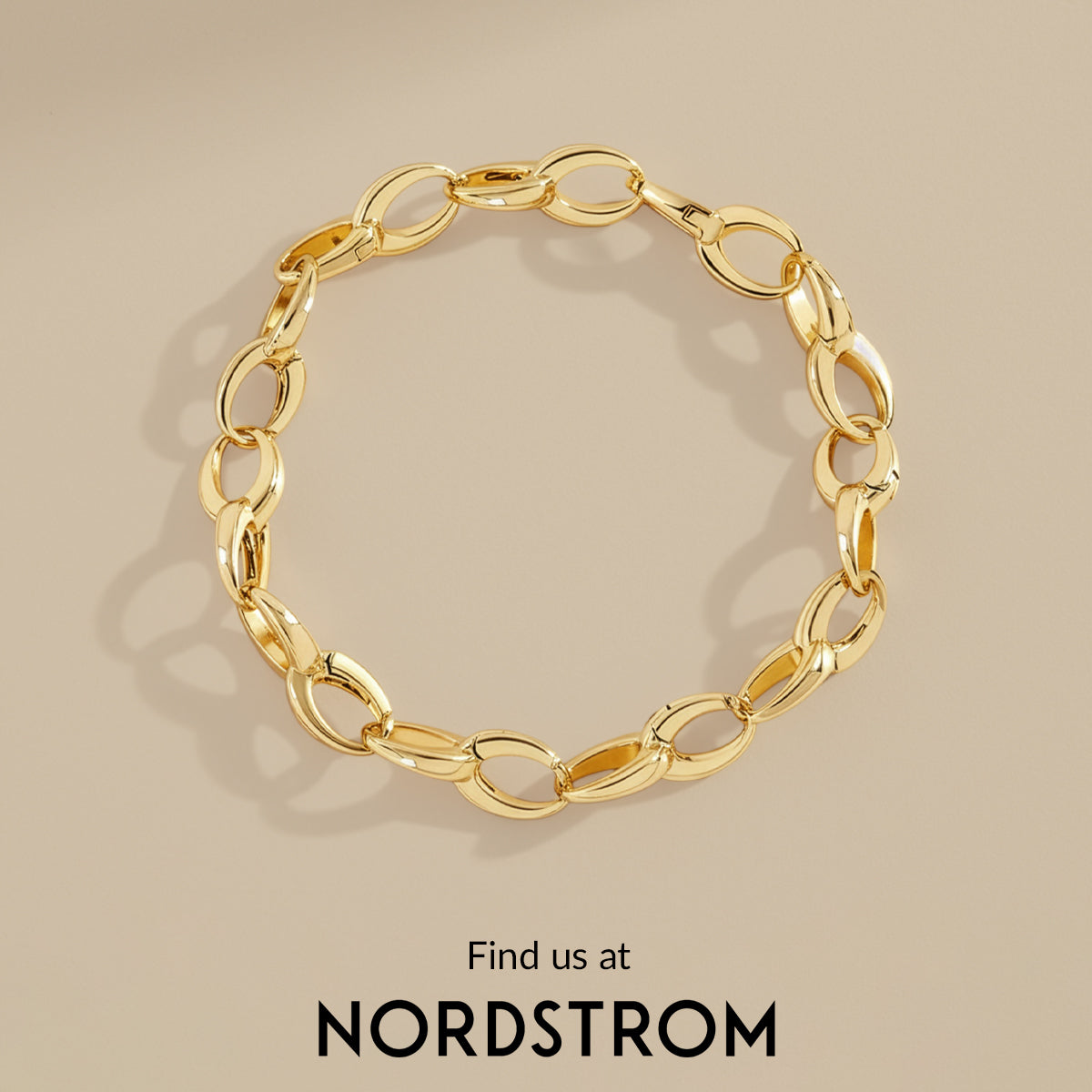 Gold chain bracelet on a beige background with Nordstrom branding.