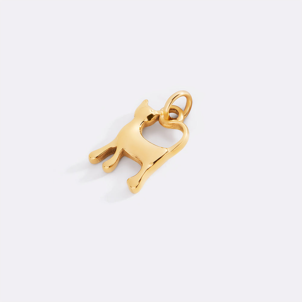 Gold cat-shaped pendant on a light gray background