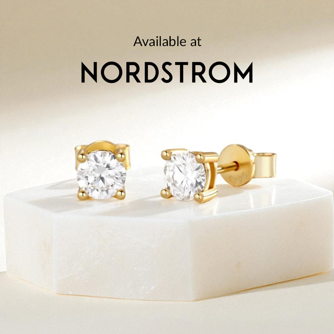 Gold stud earrings on a white block with 'Nordstrom' branding.