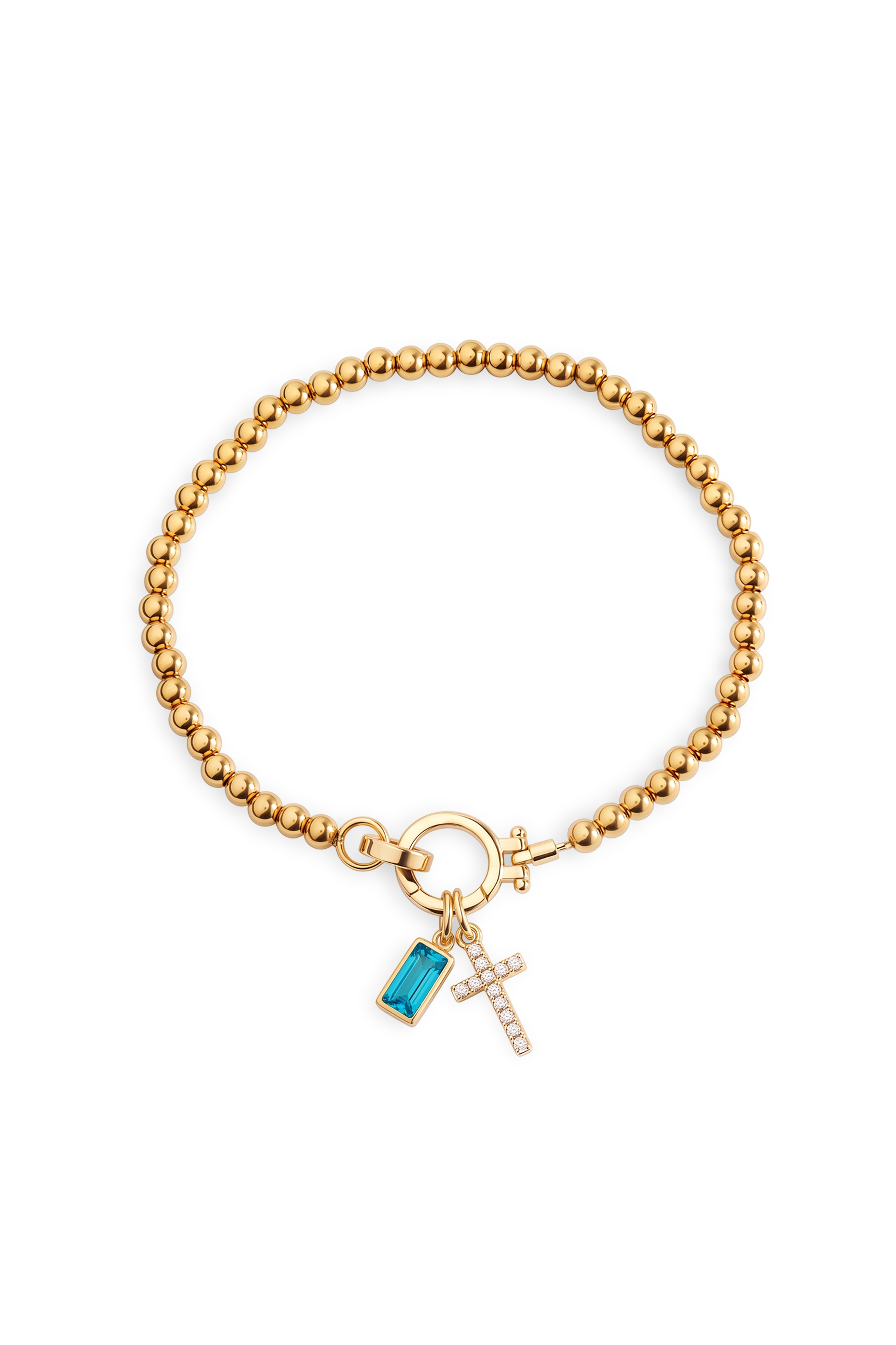 Cross Charm Birthstone Bracelet with gold beaded chain, cross charm and March aquamarine birthstone charm on a white background.