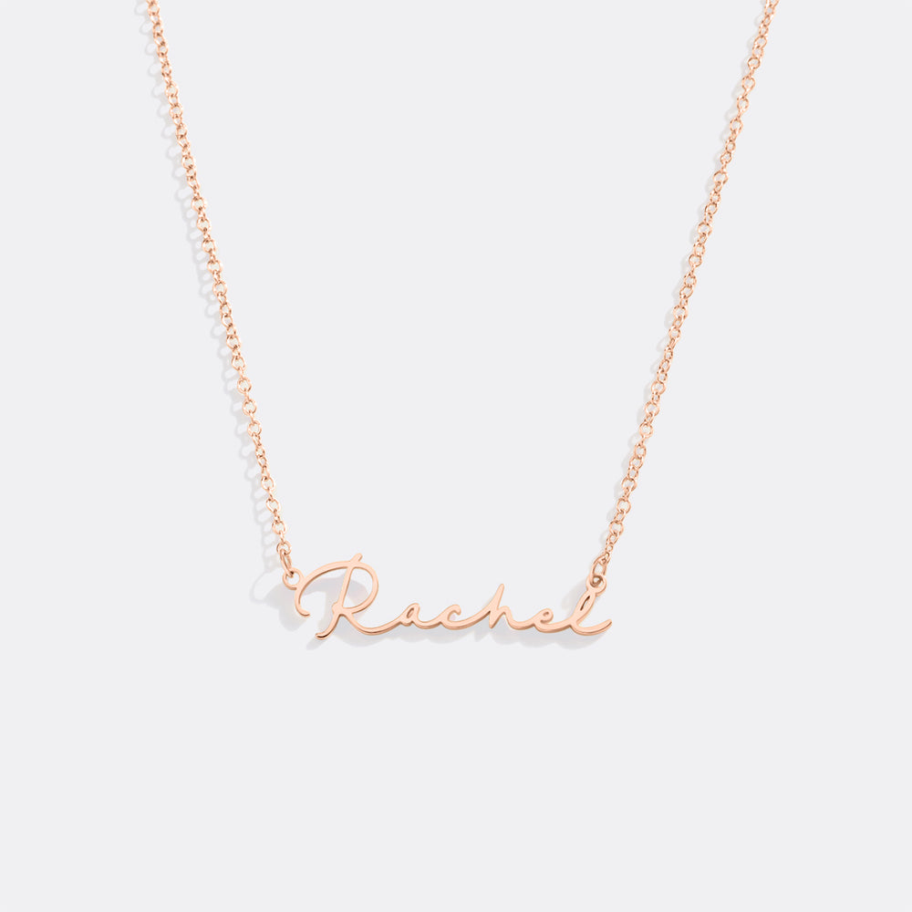 Rose gold 'Rachel' necklace on a light gray background