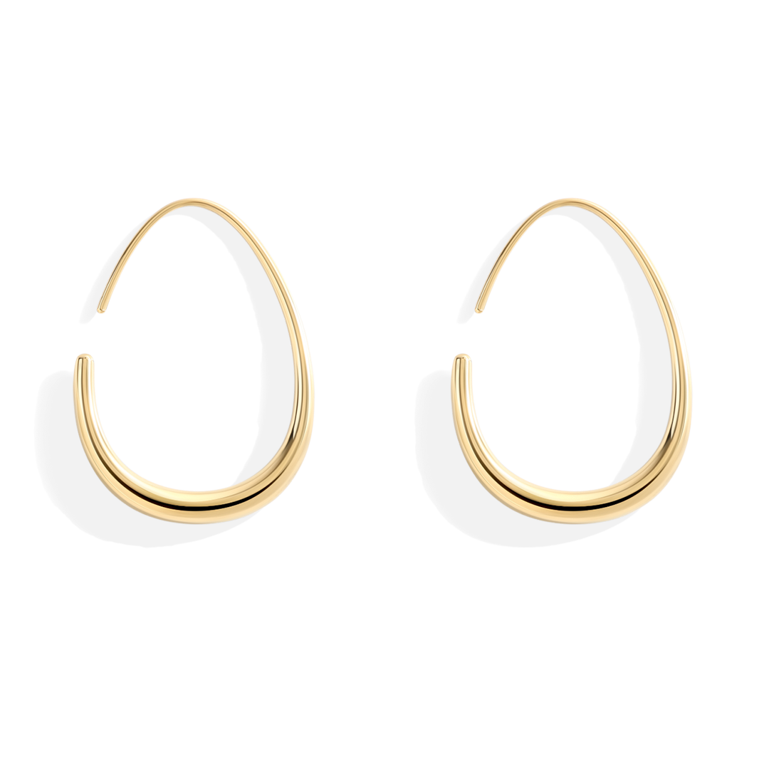 Gold hoop earrings on a white background