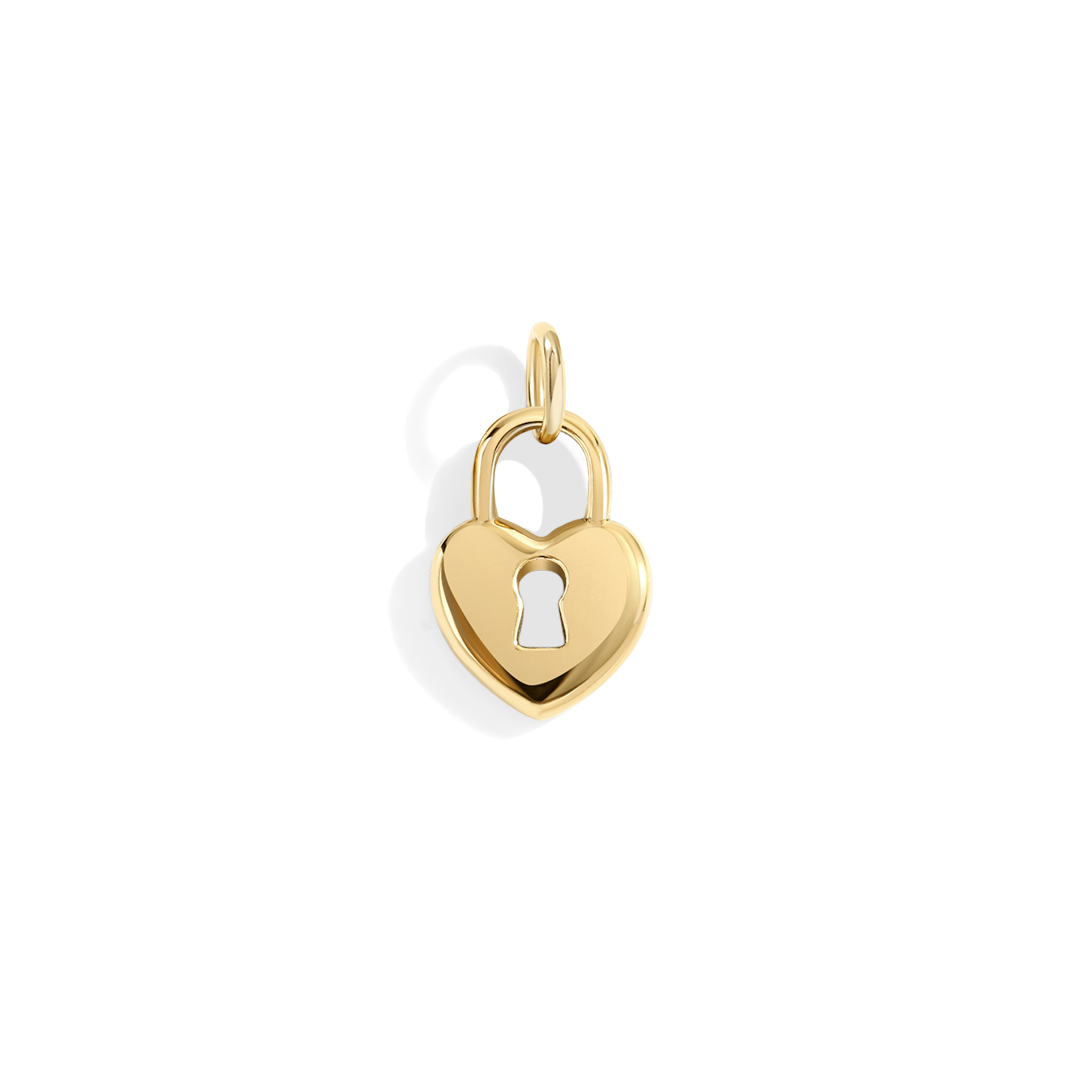 Gold heart-shaped padlock charm on a white background