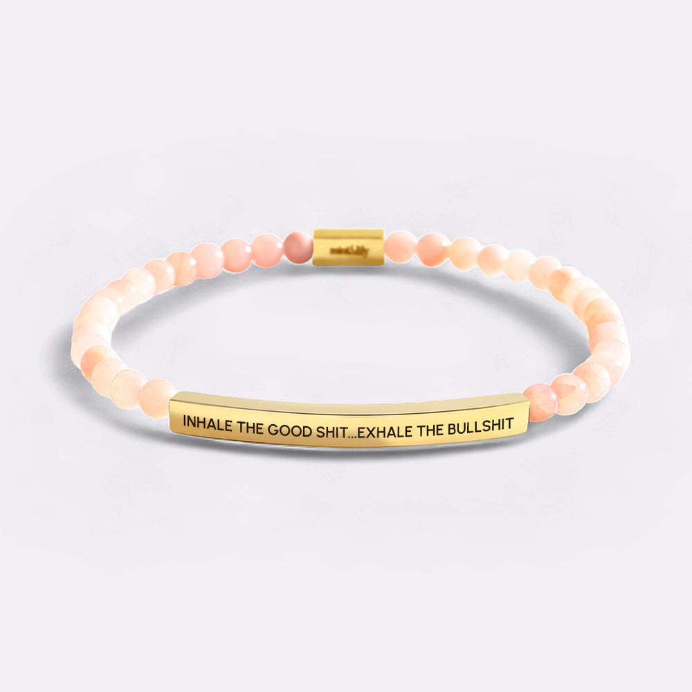 Bracelet with motivational message on a light gray background