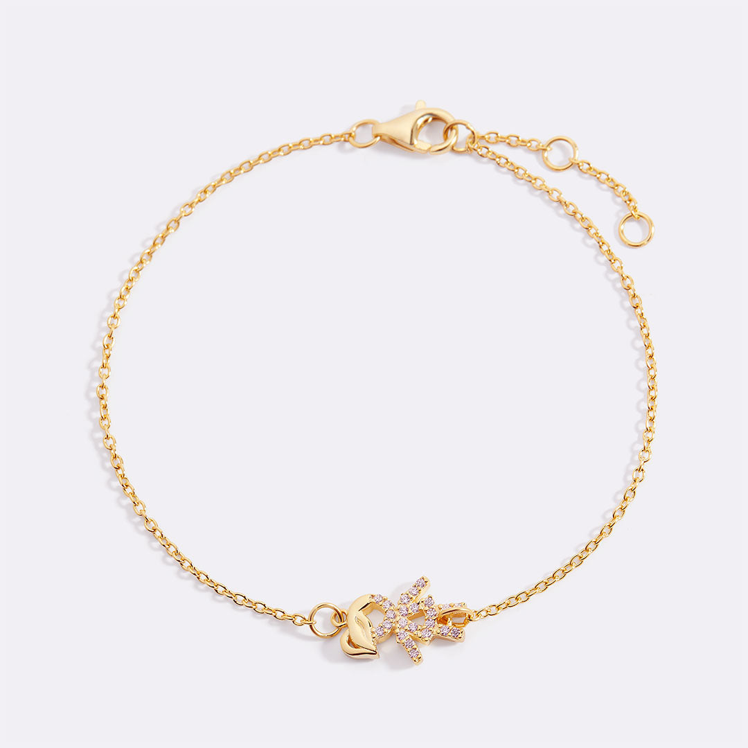 Personalized mom bracelet with kid figure charms in gold — Mint & Lily