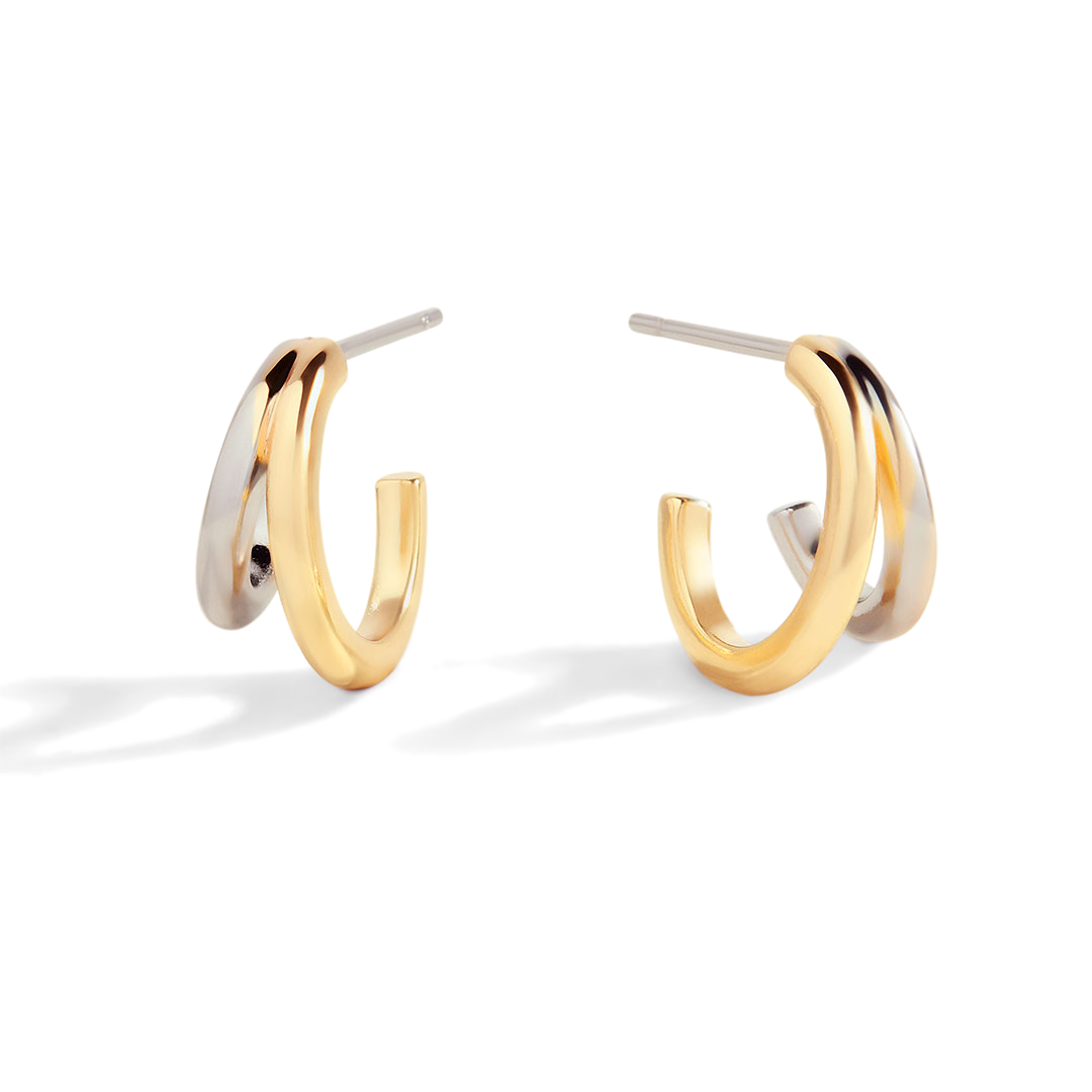 Pair of gold hoop earrings on a white background