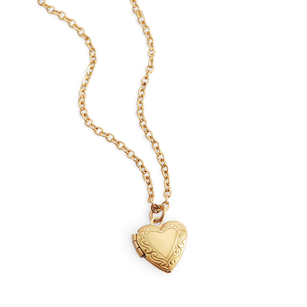 Gold heart-shaped locket necklace on a white background.