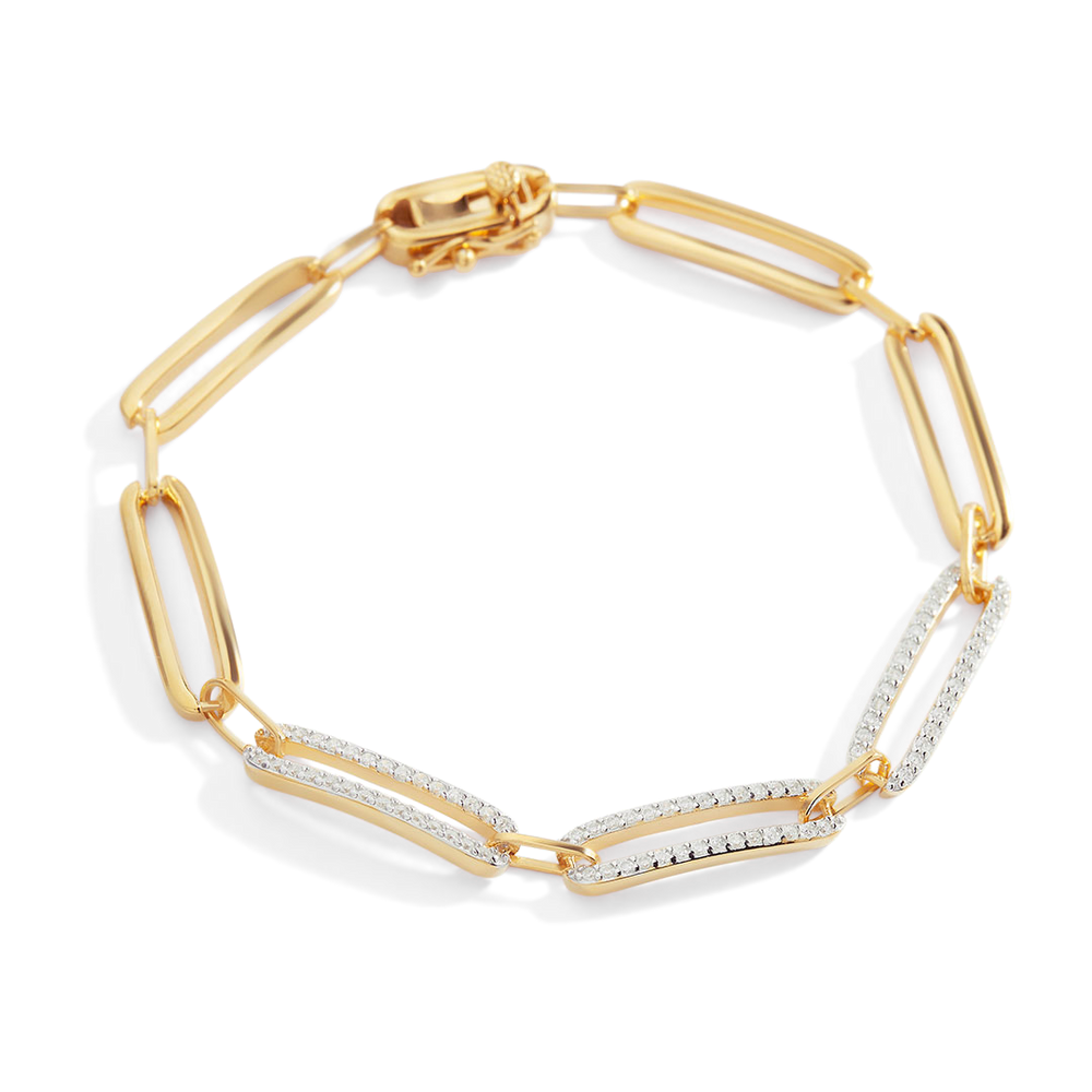 Gold bracelet with diamond accents on a white background