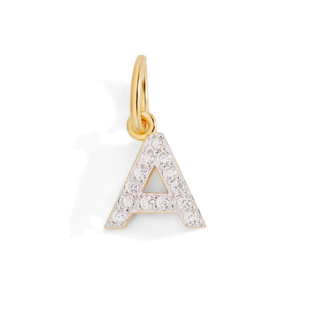 Gold and diamond letter 'A' pendant on a light gray background