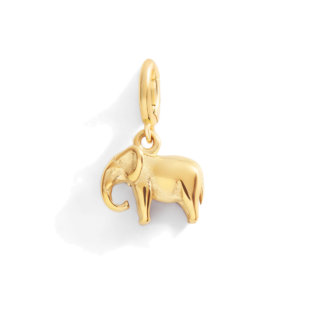 Gold elephant pendant on a light gray background