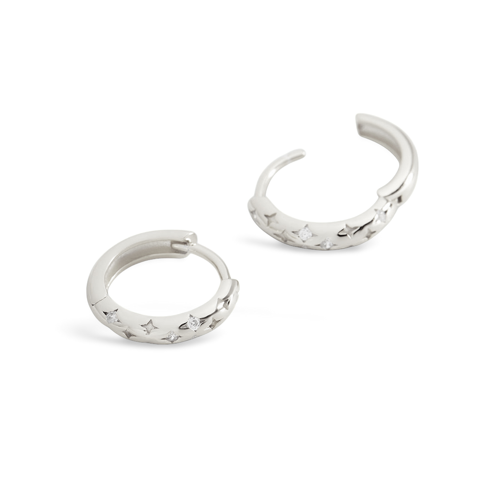 Pair of silver hoop earrings on a white background