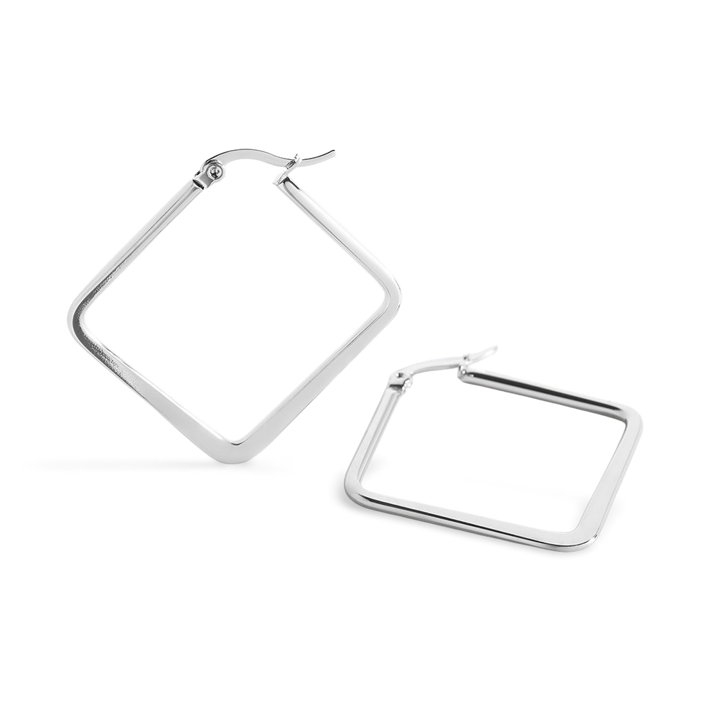 A pair of silver-colored geometric boss earrings with a straight post and snap closure.
