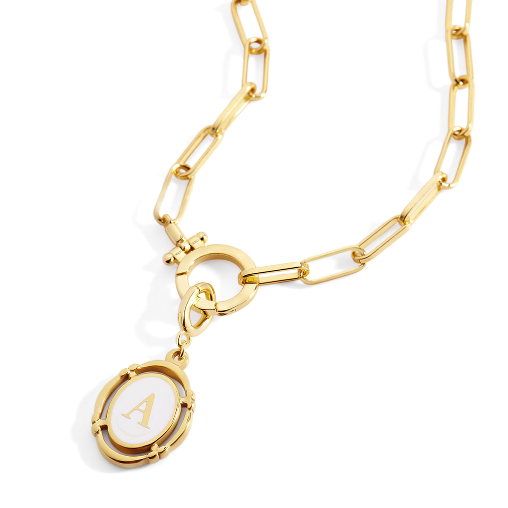 Gold chain bracelet with a round charm featuring the letter 'A' on a white background