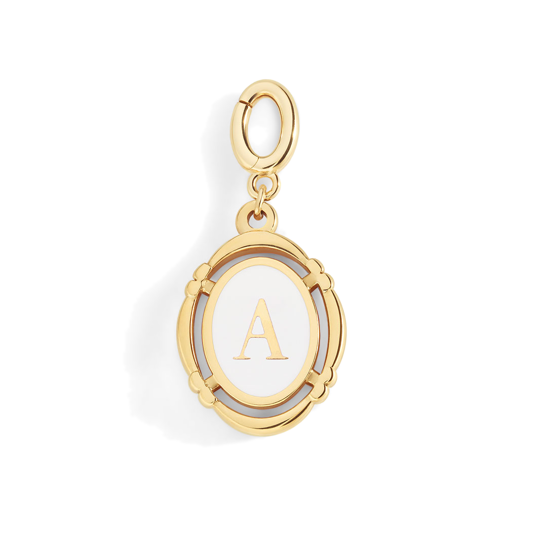 Gold pendant with letter 'A' on a light gray background