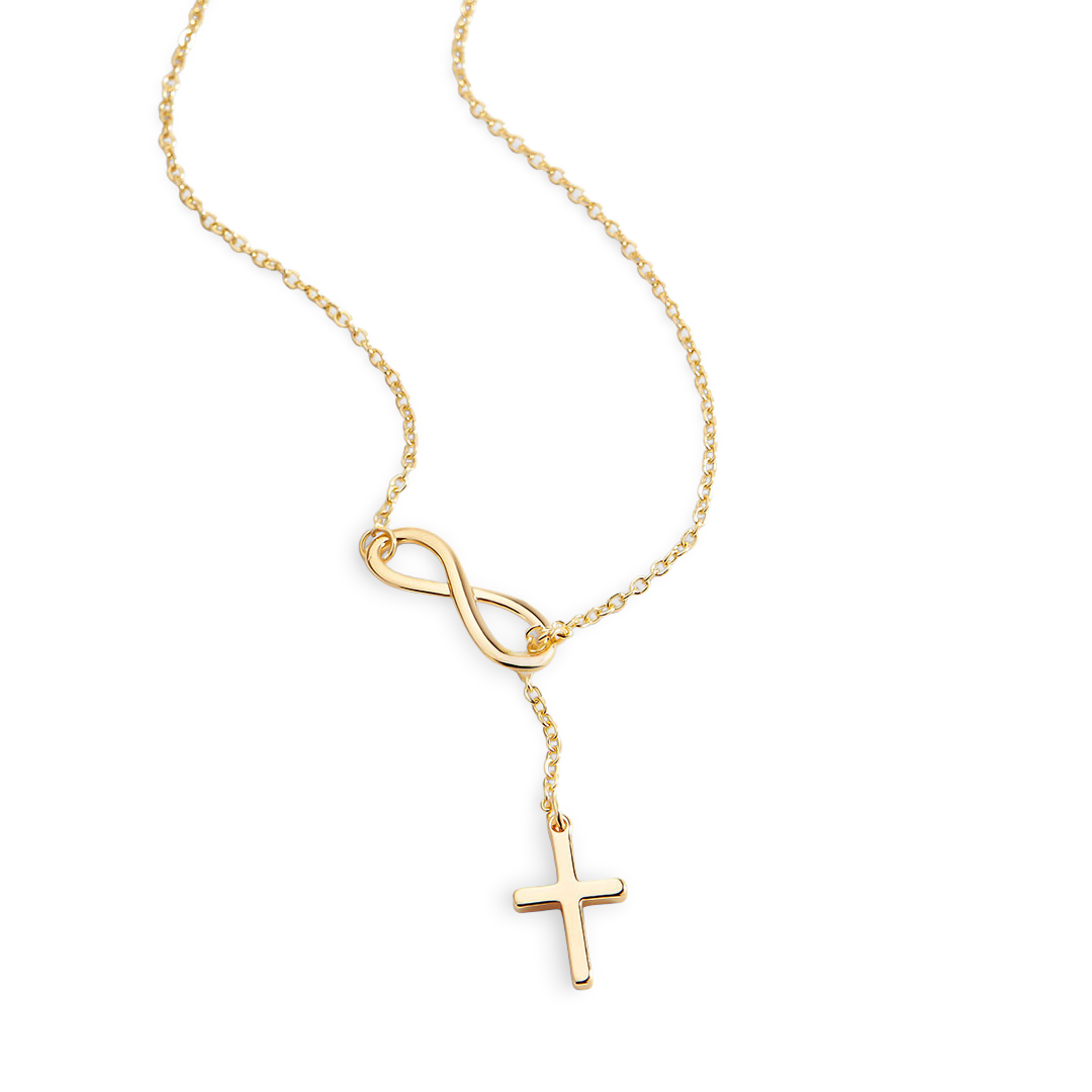 Gold necklace with an infinity symbol and cross pendant on a light gray background