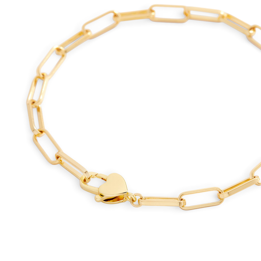 Gold bracelet with a heart clasp on a light gray background