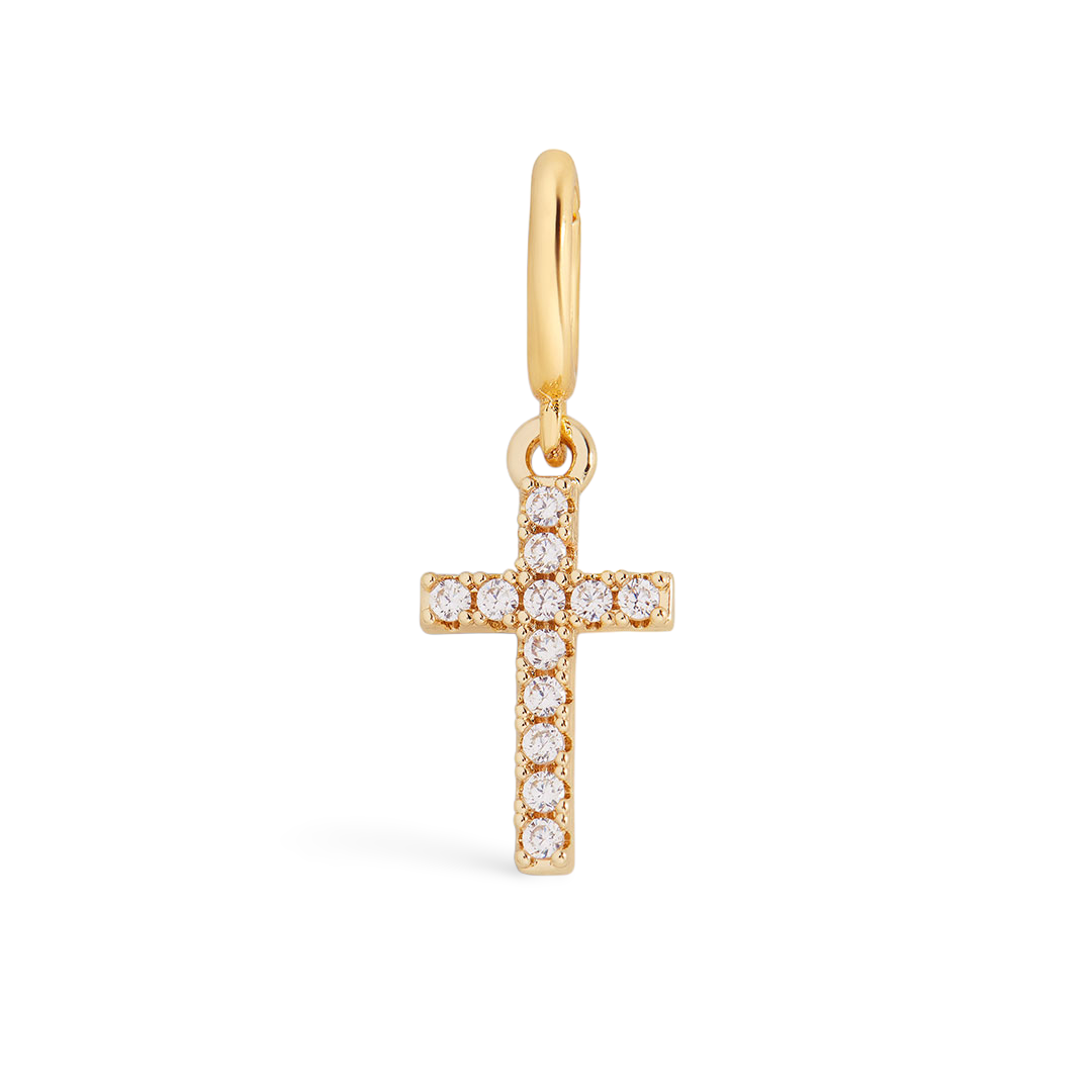 Gold cross pendant with clear stones on a light gray background
