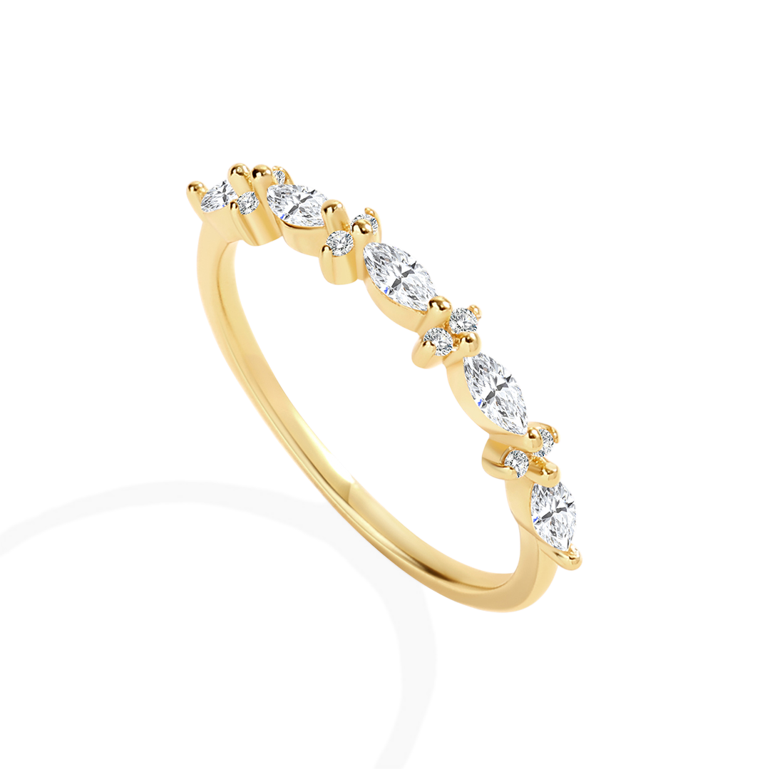 Gold ring with diamonds on a white background