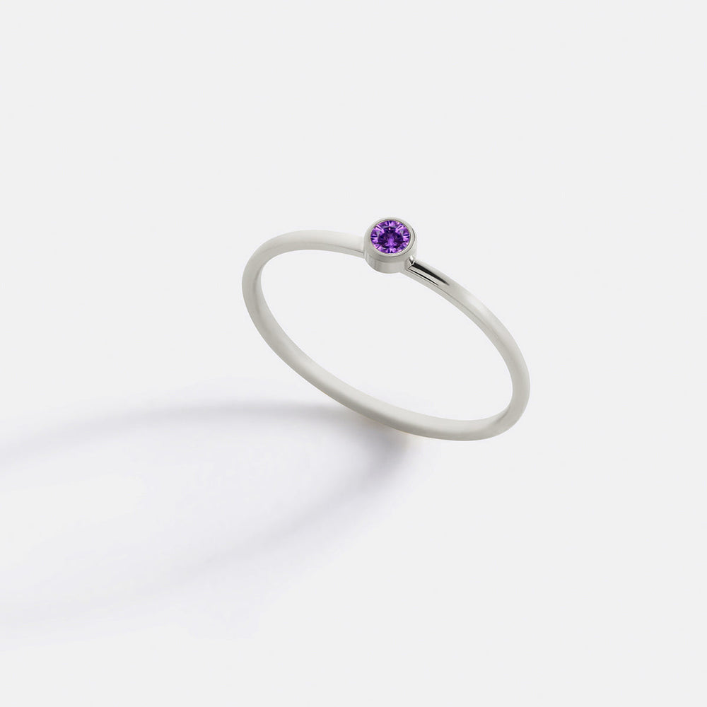 https://cdn.shopify.com/s/files/1/1342/2527/files/Minimalist_birthstone_stacking_band_1-june-silver.jpg?v=1731512373