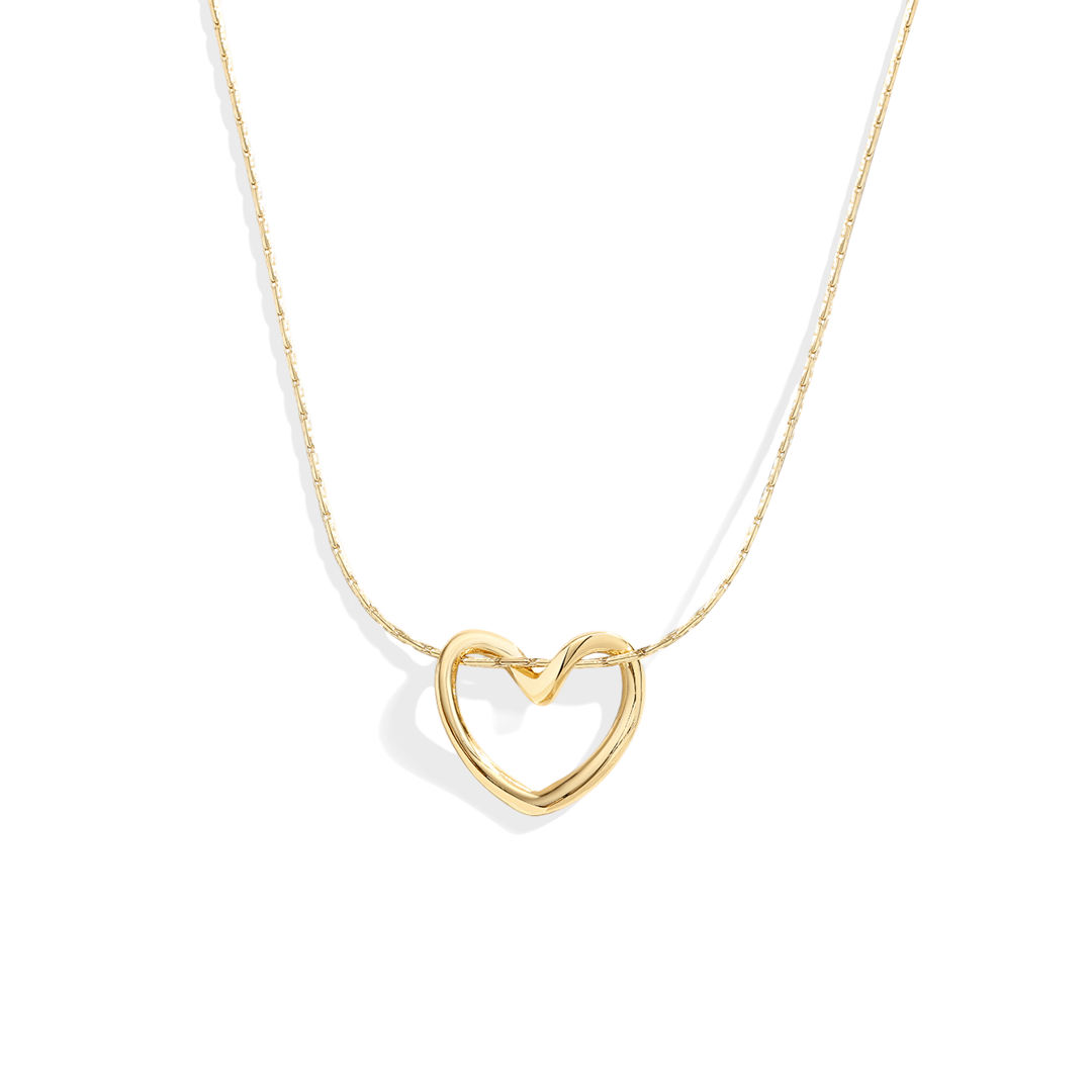 Gold heart-shaped pendant necklace on a white background