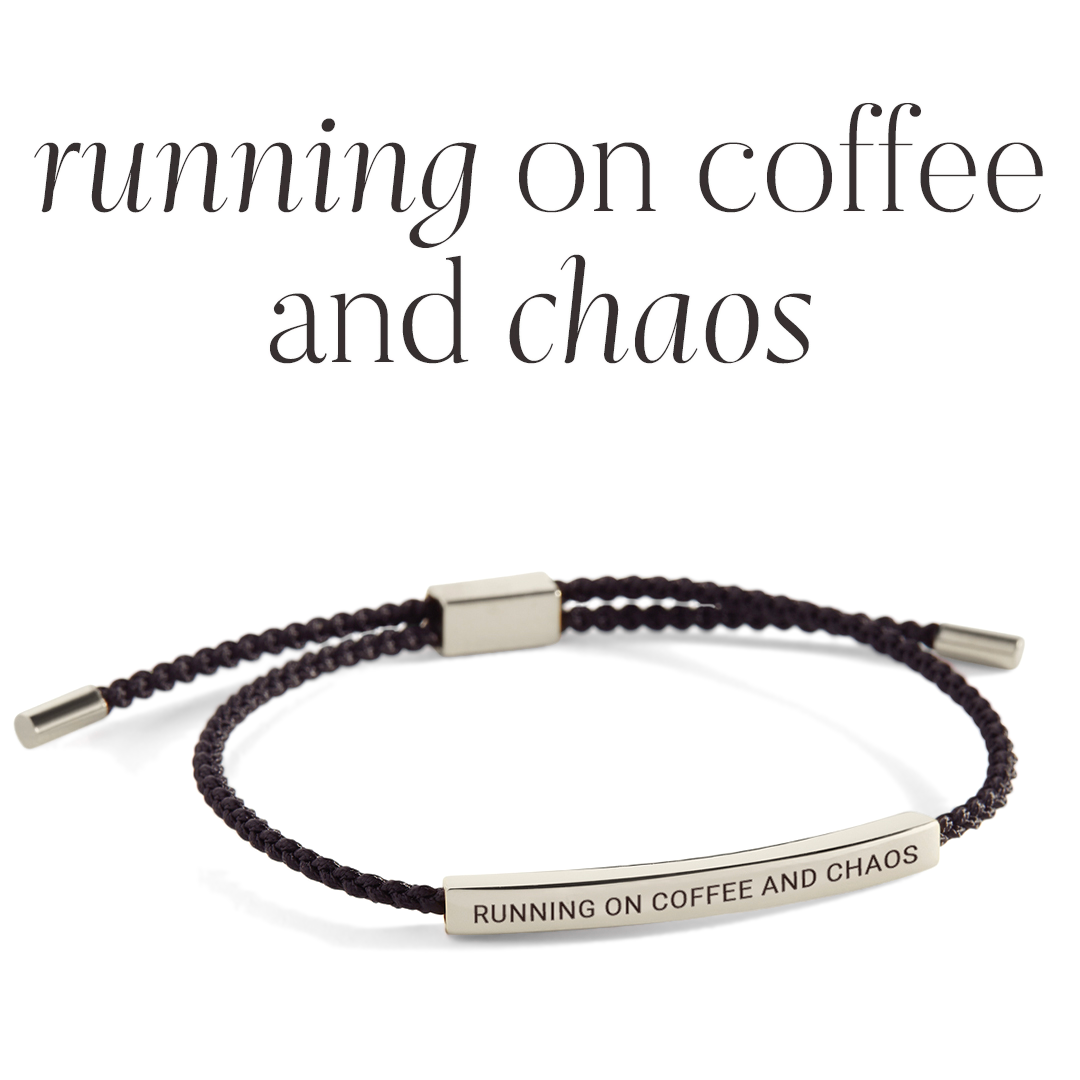 Bracelet with 'Running on Coffee and Chaos' text on a light gray background