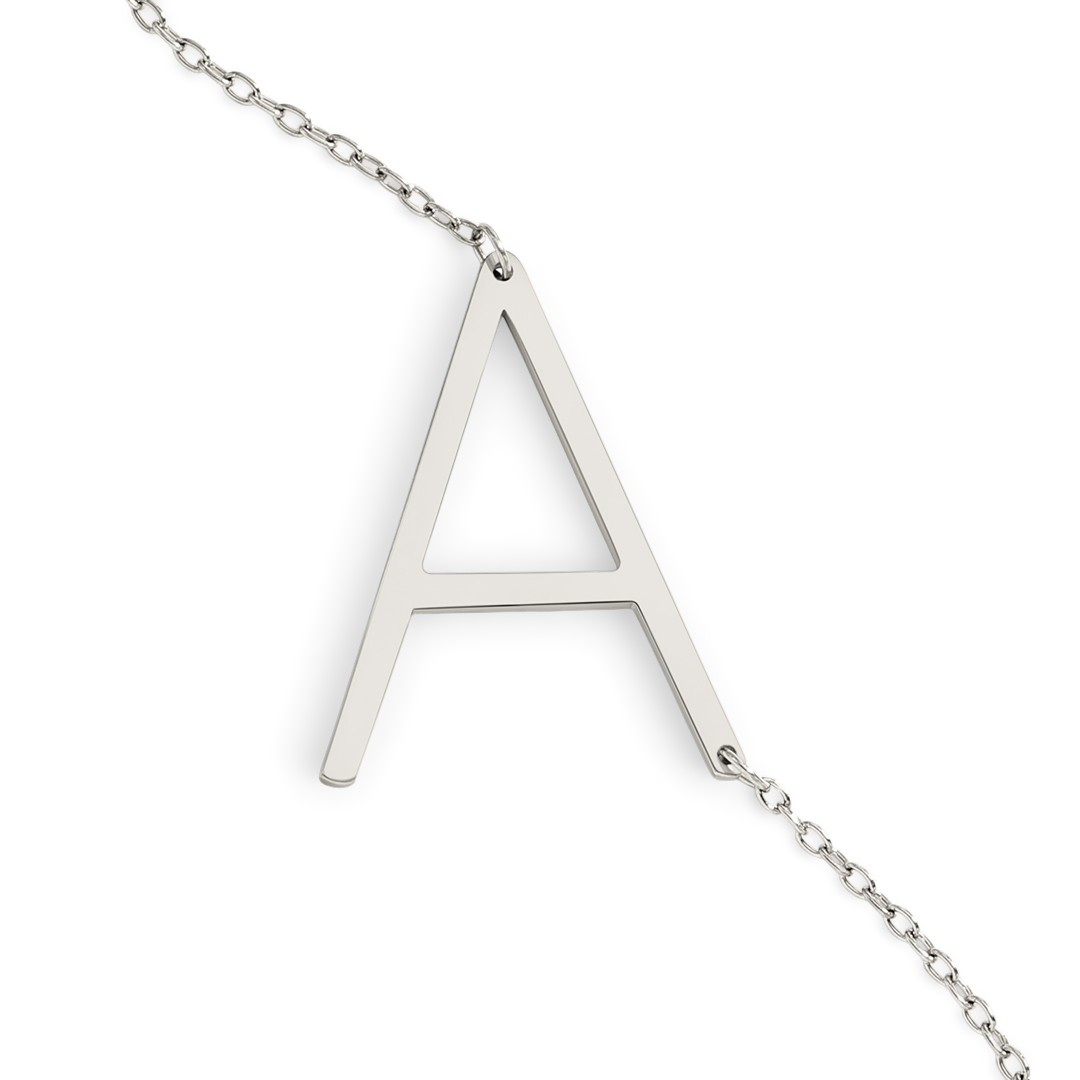 Silver necklace with a letter 'A' pendant on a light gray background
