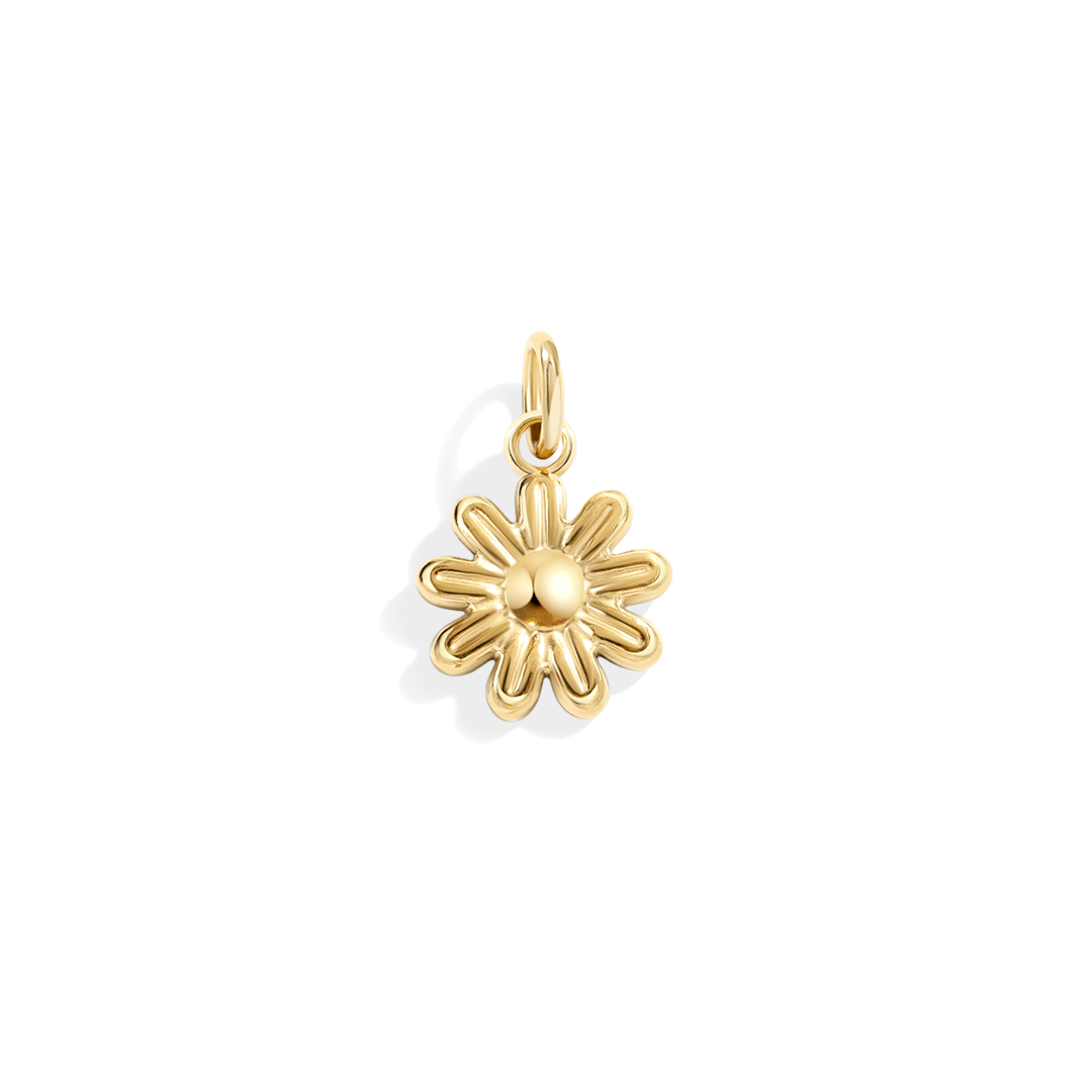 Gold flower-shaped pendant on a white background
