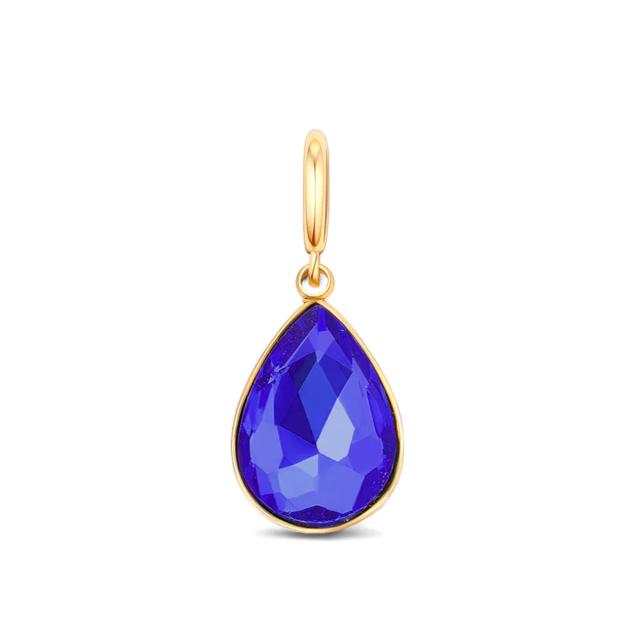 Gold pendant with a blue teardrop-shaped gemstone on a light gray background
