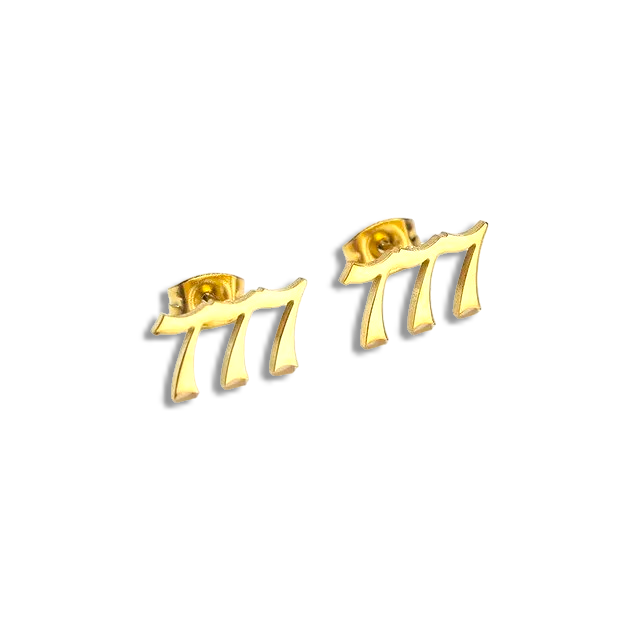 A pair of gold-colored earrings designed with the number '7' on each, against a black background.