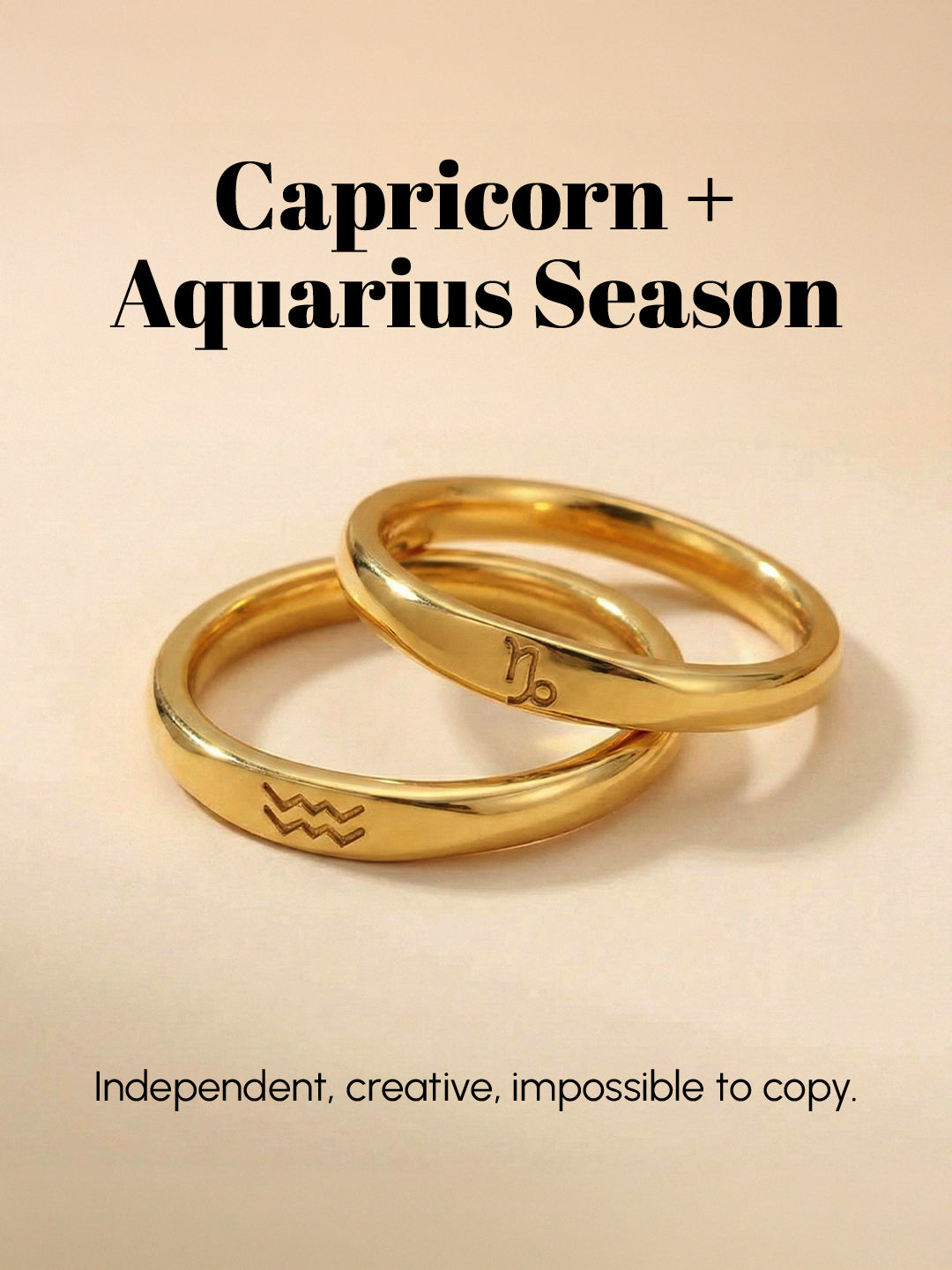 Two gold rings with zodiac symbols on a beige background, featuring text about Capricorn and Aquarius season.
