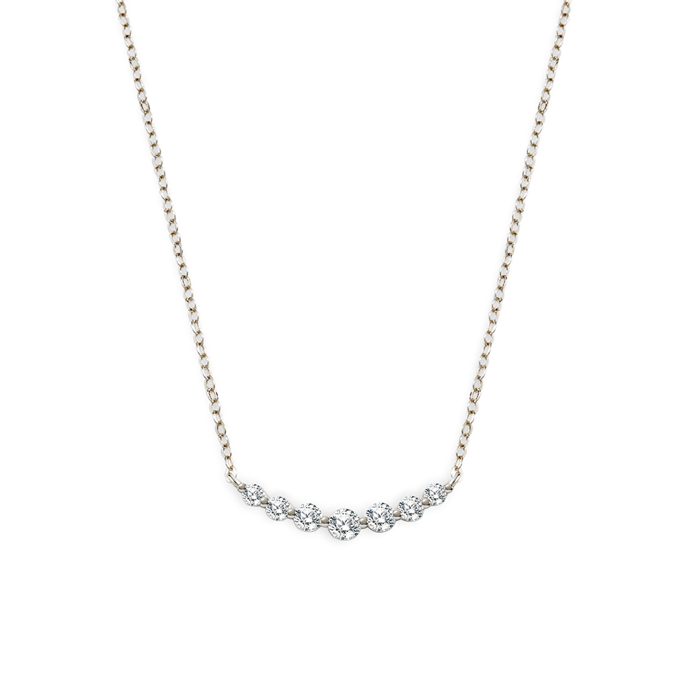 Delicate silver necklace with small diamonds on a white background