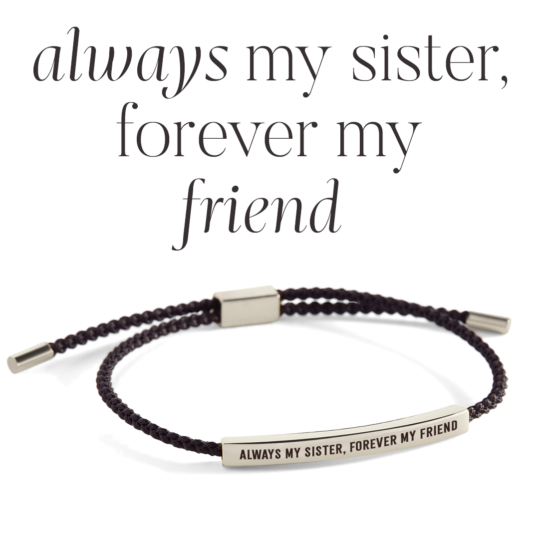 Bracelet with engraved message 'Always my sister, forever my friend' on a light background