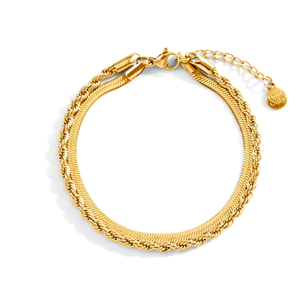 Gold bracelet on a white background