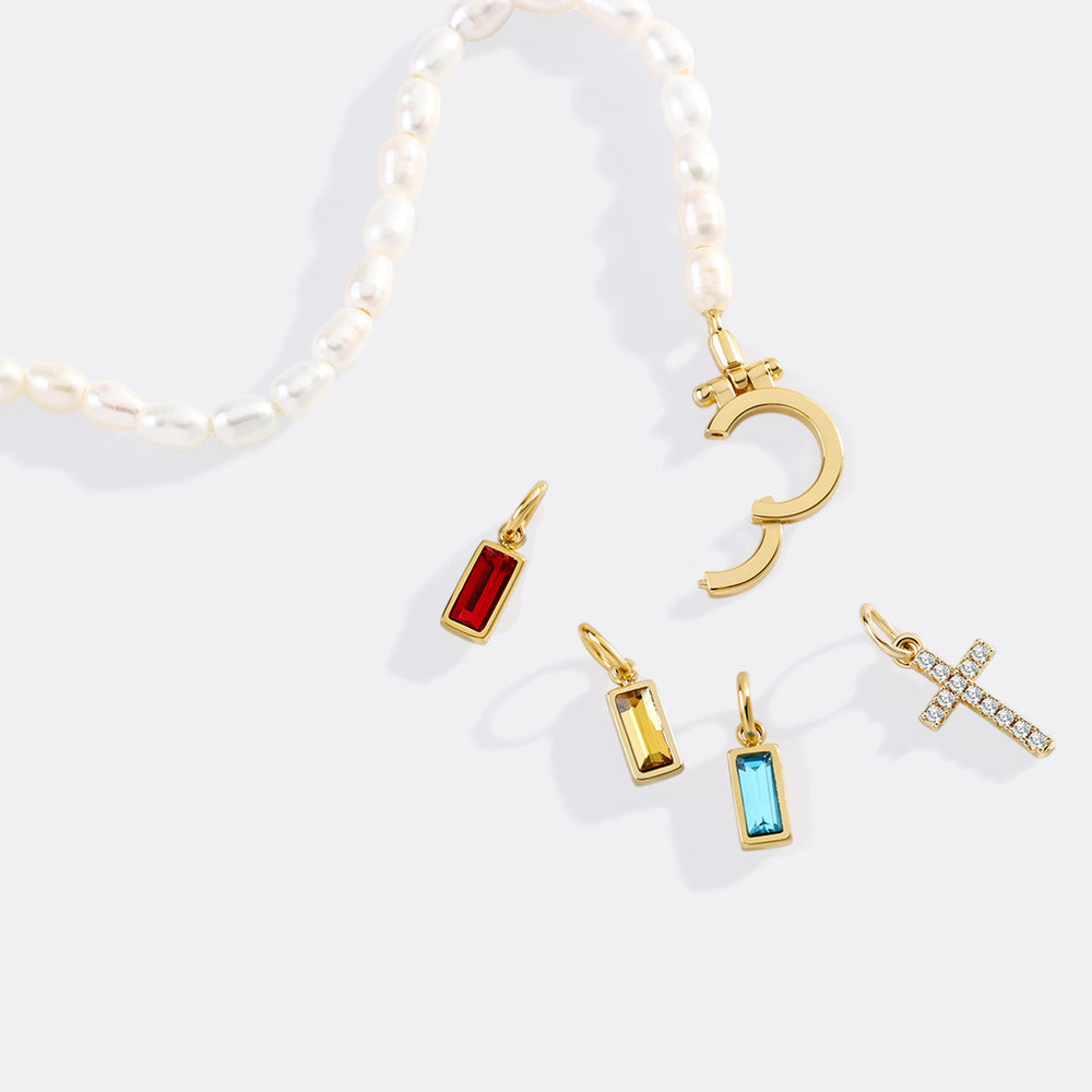 https://www.dropbox.com/scl/fi/15krxl7v4oxbzf02yjlsz/Pearl-Cross-Charm-Bracelet_14.jpg?rlkey=ww0j8g29o15s7ixn5tlyjn3dq&st=zgzp01sx&dl=0