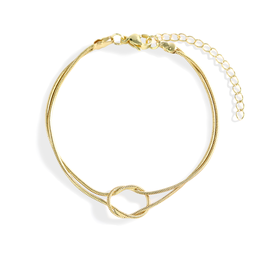 Gold bracelet on a white background