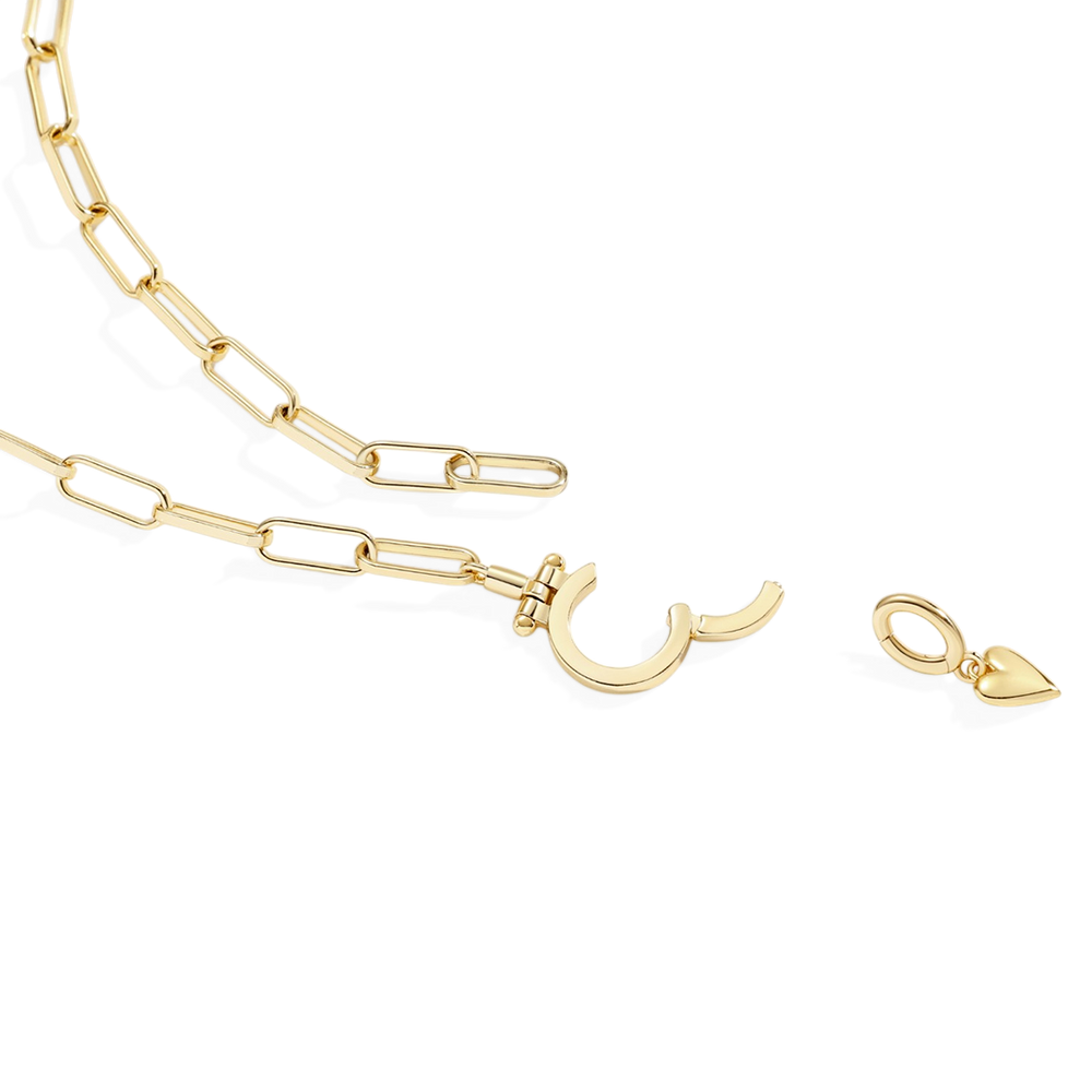 Gold chain necklace with a unique clasp on a white background