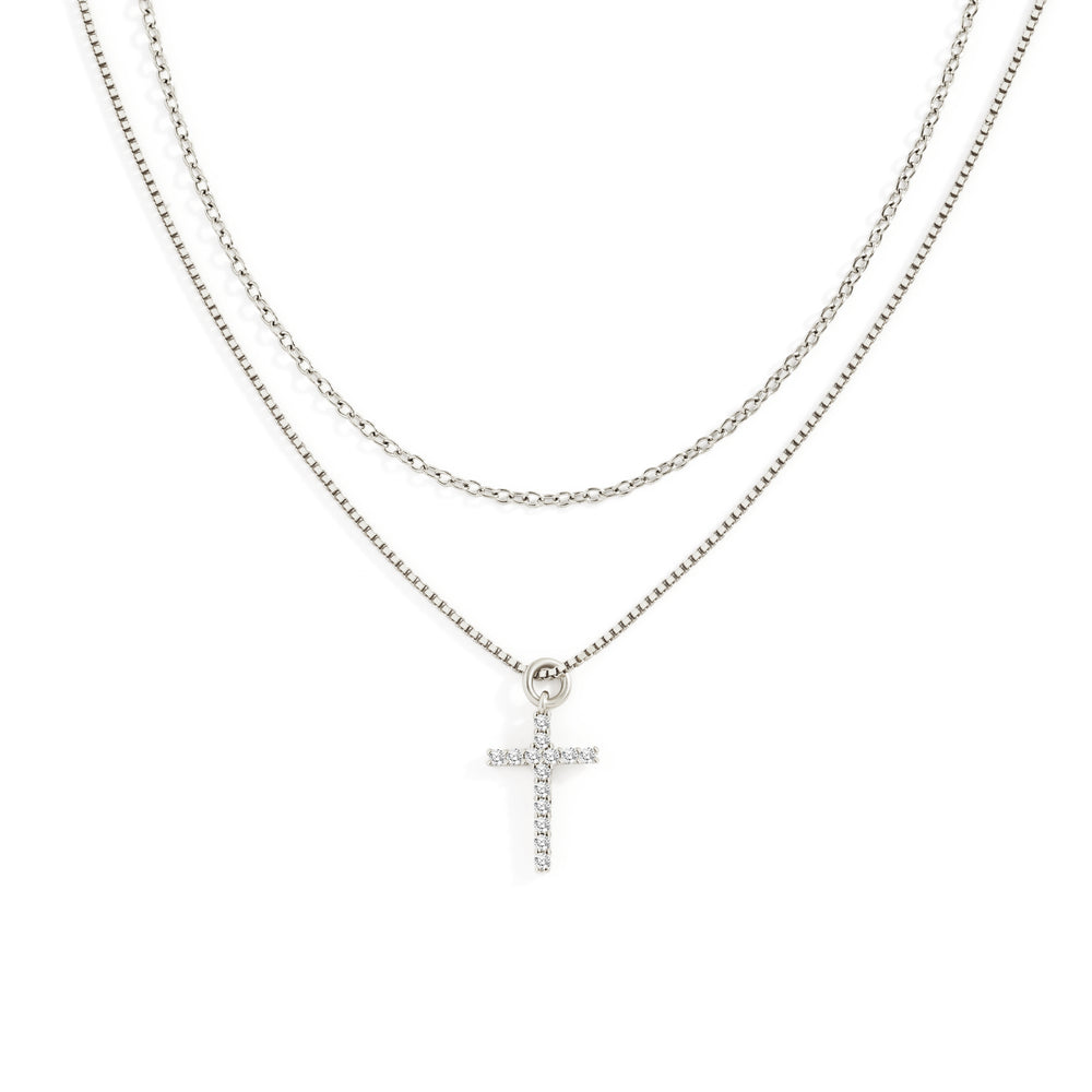 Silver necklace with a cross pendant on a white background