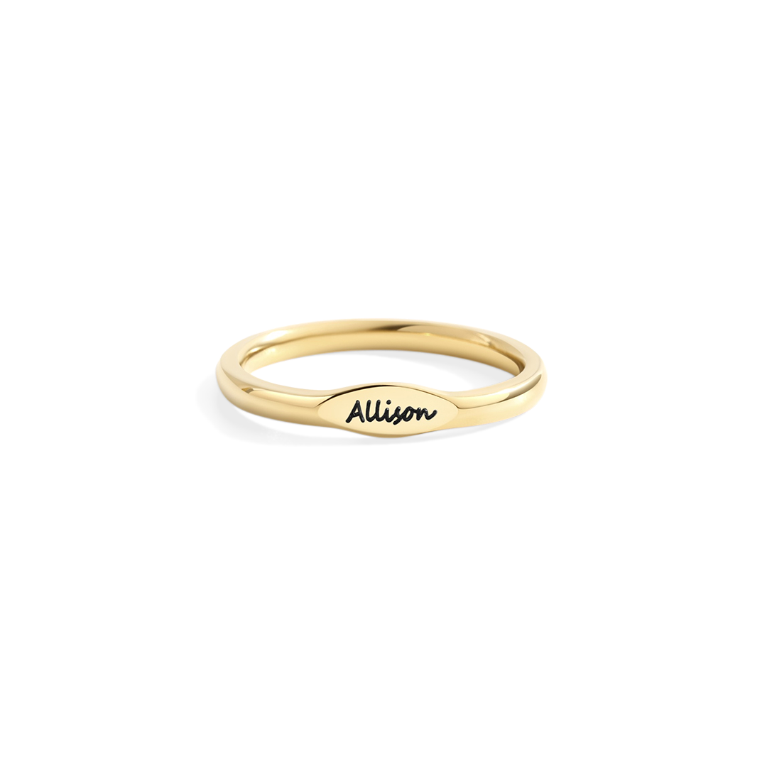 Gold ring with 'Allison' engraving on a white background