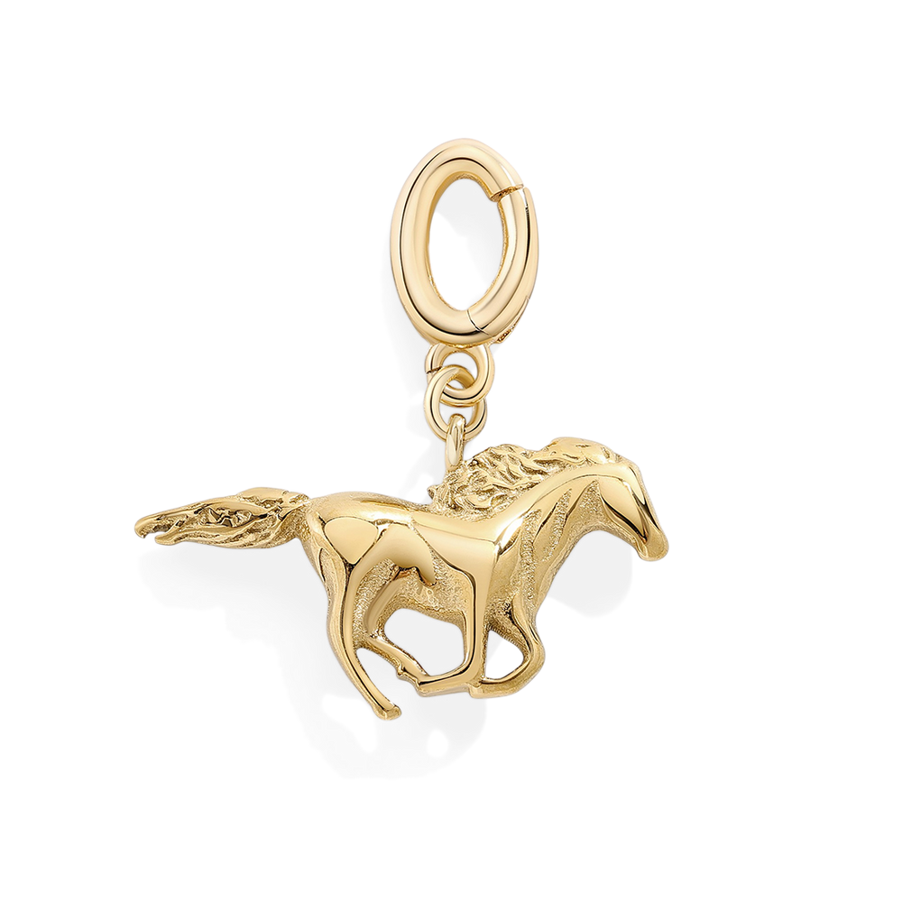 Gold horse charm on a white background