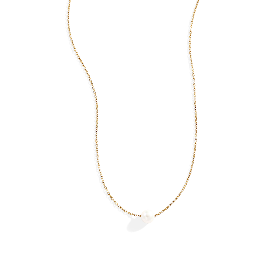 Gold necklace with a single pearl pendant on a light gray background