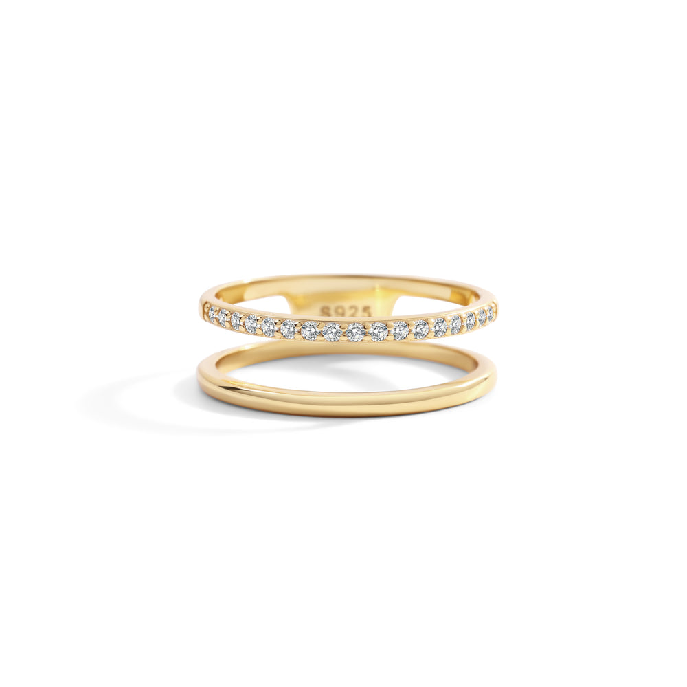 Two gold rings with diamond accents on a white background