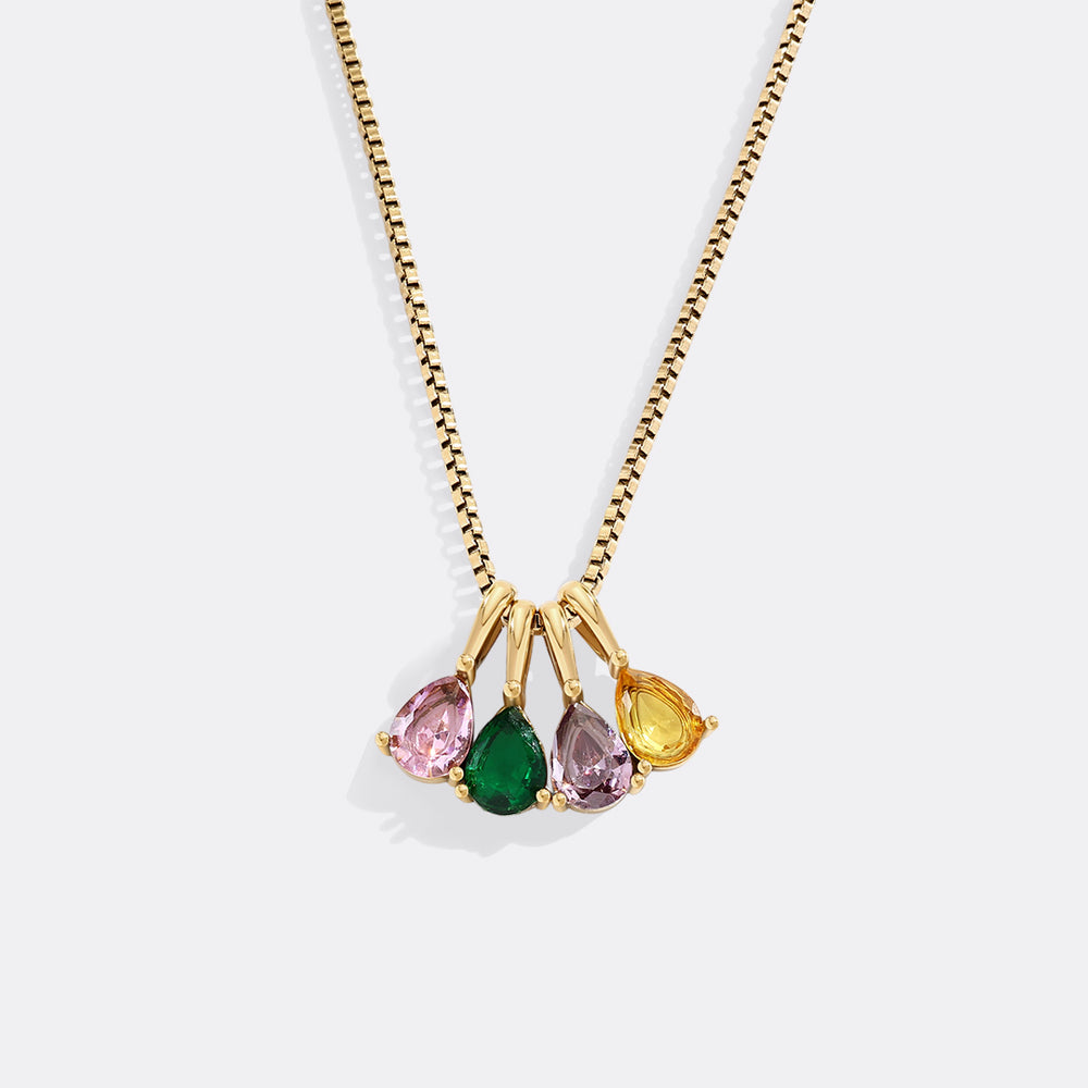 Necklace with multicolored gemstones on a white background